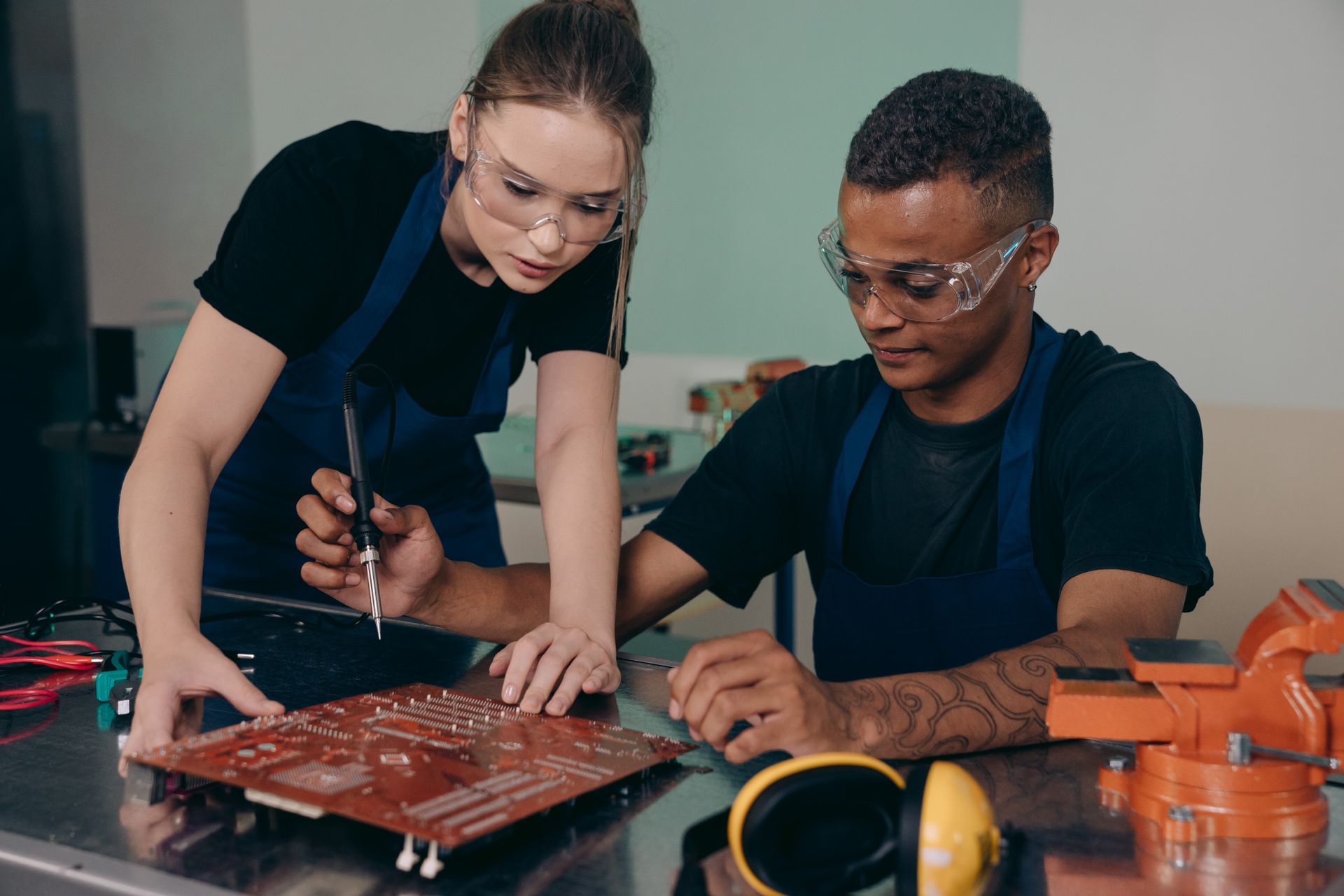 Engineers collaborating on a technical assessment in the laboratory