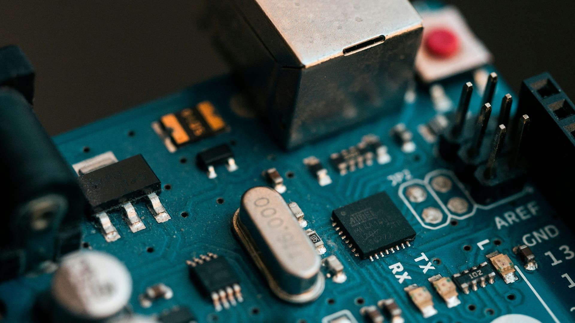 Macro detail of a populated printed circuit board showing individual components