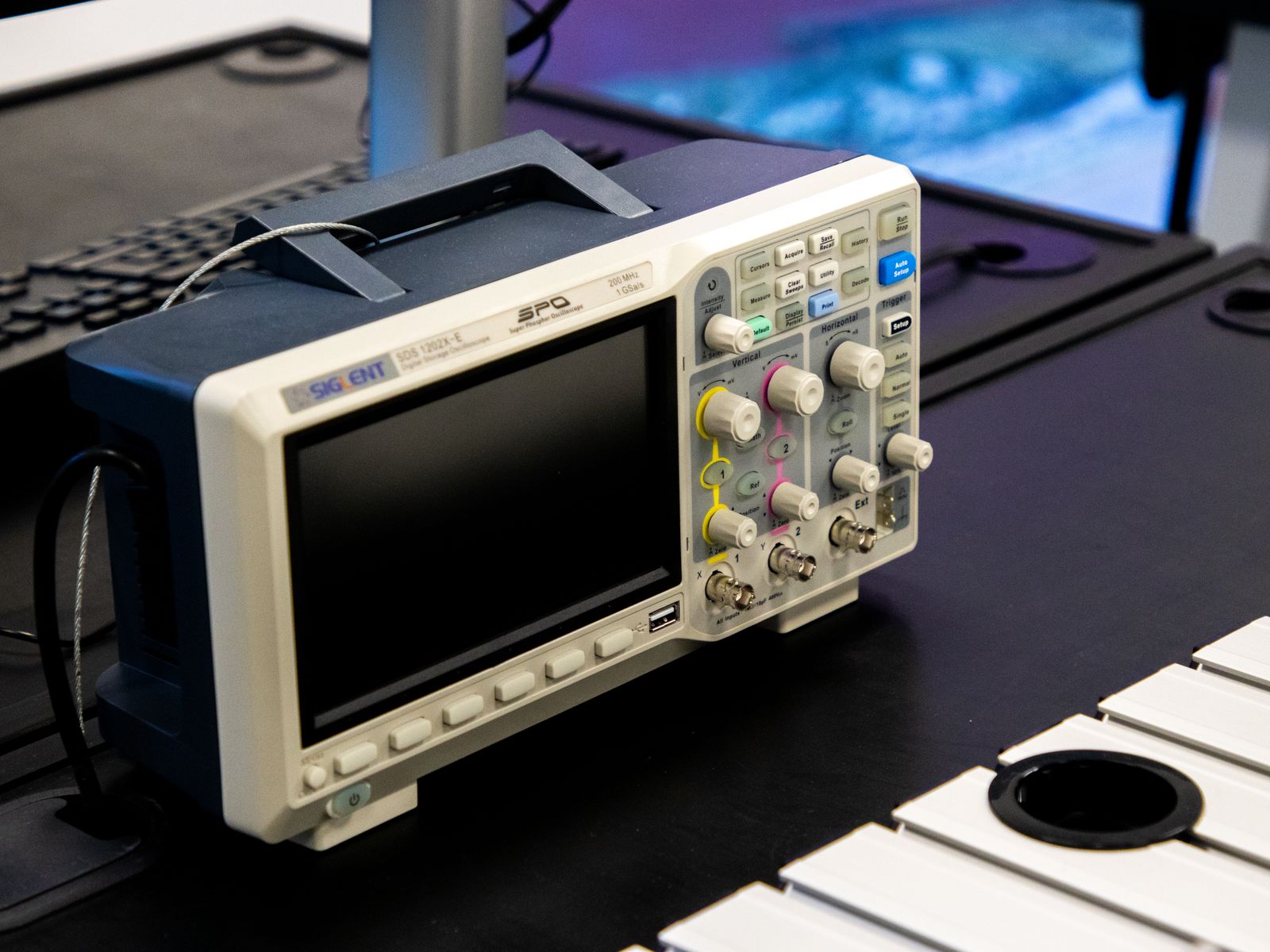 Oscilloscope displaying a signal trace during electrical diagnostics